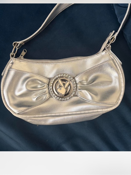 PLAYBOY Handbags - PLAYBOY Metallic SILVER Bow Shoulder Bag with Logo Medallion